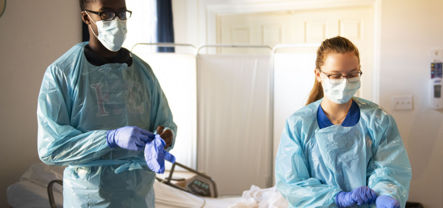CNA students donning PPE