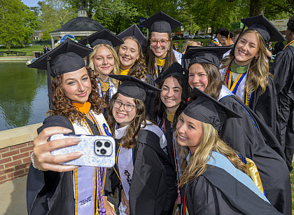 Group of graduates taking a selfie