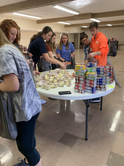 Students work with local community organization, Faith in Action.