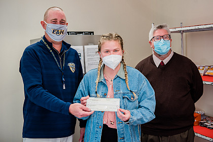 Reception of check in honor of stinger supply shelf