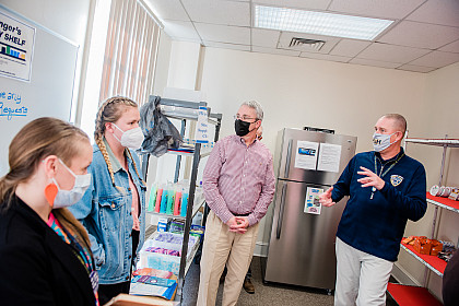 Reception of check in honor of stinger supply shelf