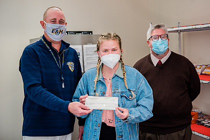 Reception of check in honor of stinger supply shelf