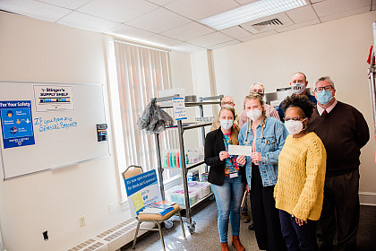 Reception of check in honor of stinger supply shelf