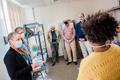 Reception of check in honor of stinger supply shelf
