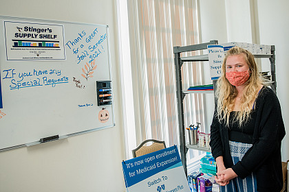 Ribbon cutting ceremony for Stingers Supply Shelf