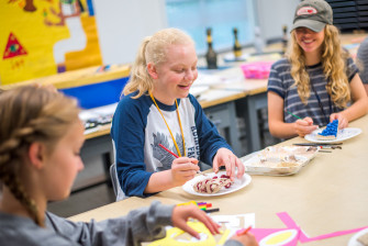 Students at Emory & Henry's Summer Scholars Institute camp enjoy making art.