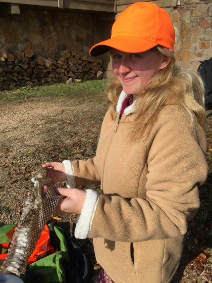 Student with a snakeskin.