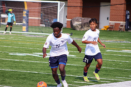 E&H students playing in a soccer match